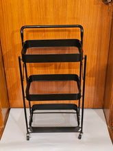 Home Sajawat matte black 3-tier rolling utility cart with metal mesh baskets and a top handle for home organization.
