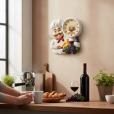 Home Sajawat decorative chef wall clock with coffee graphic, bread, and grapes, mounted on a kitchen wall.
