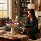 Home Sajawat cream ceramic decorative pedestal fruit bowl with gold leaf accents and butterfly details.