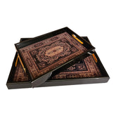 Home Sajawat decorative serving tray set featuring black frames and intricate traditional Persian-style patterns.