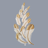 Home Sajawat white metal feather wall art with gold tips and textured detailing. Elegant sculpture.