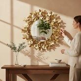 Home Sajawat golden butterfly round wall mirror, a decorative piece for home decor.