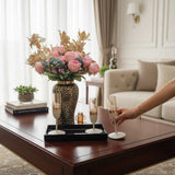 Home Sajawat decorative ceramic vase with leopard print, gold rim, and faux floral arrangement. Includes tray and champagne flutes.
