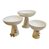 Home Sajawat decorative pedestal fruit bowl set in cream ceramic with gold leaf accents. Set of 3.