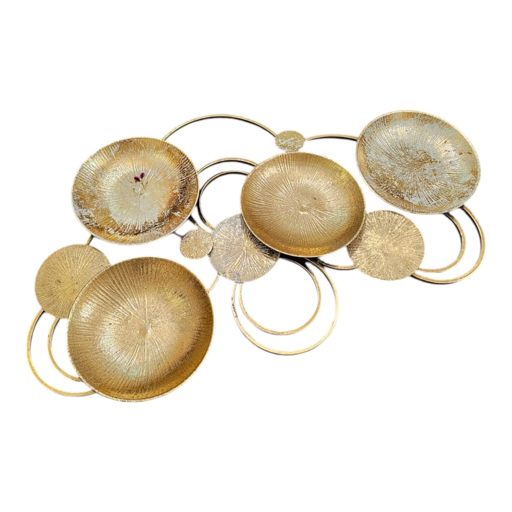 Home Sajawat abstract gold metal wall art sculpture with circular plates and rings, textured finish.