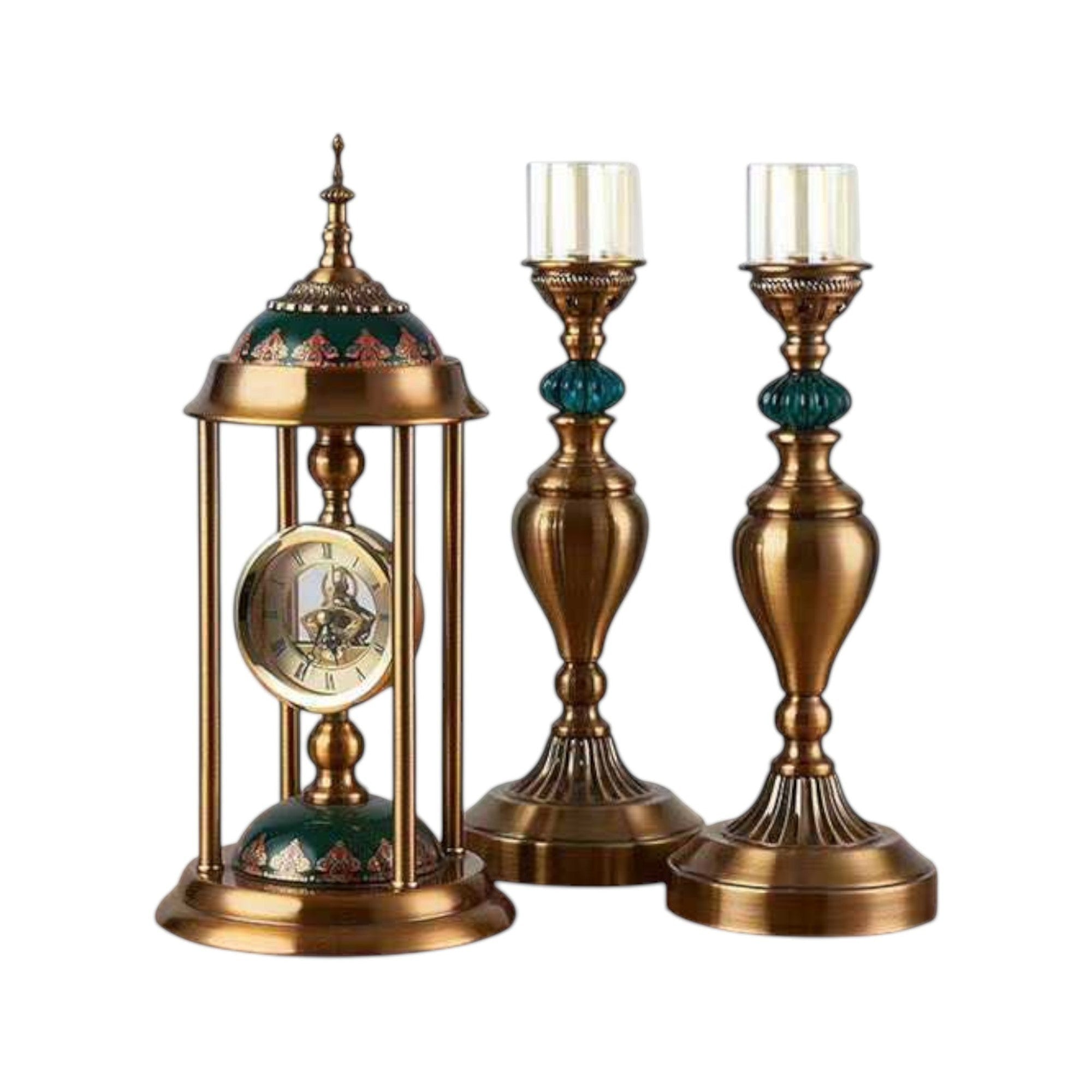 Home Sajawat antique brass table clock with Roman numerals and emerald green top, paired with two candelabras with teal accents.
