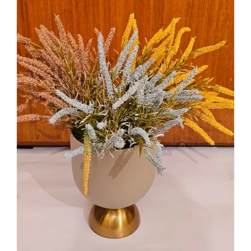 Home Sajawat artificial floral arrangement with pink, blue, and yellow stems in a beige bowl with a gold pedestal base
