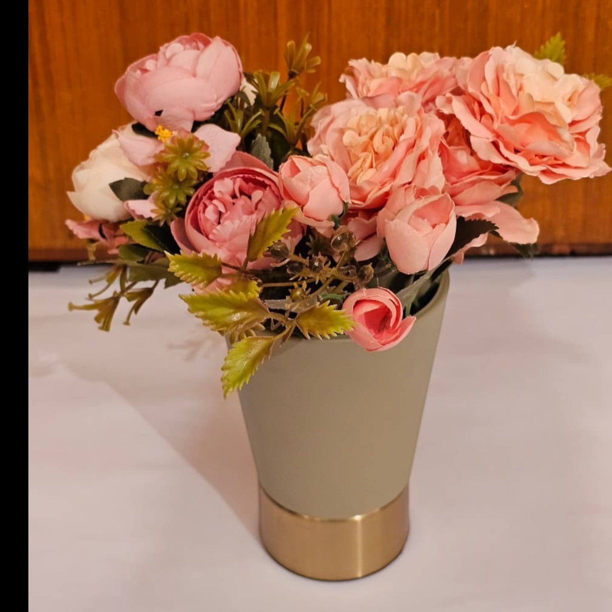 Home Sajawat artificial pink rose arrangement in a modern matte grey vase with a metallic gold base.