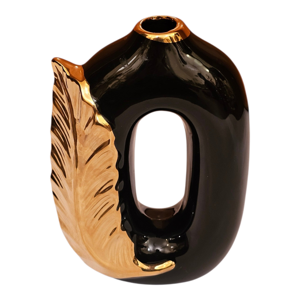 Home Sajawat modern ceramic vase in glossy black with a metallic gold feather accent and unique open-center design.