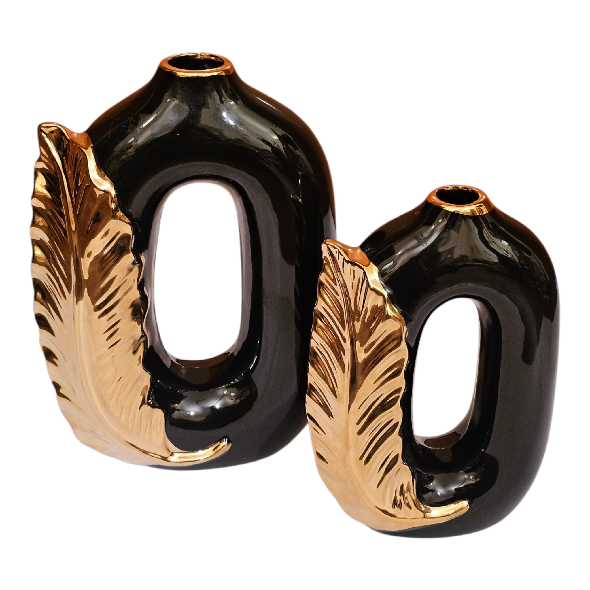 Home Sajawat set of two modern black ceramic vases with metallic gold feather accents and open-center silhouettes.