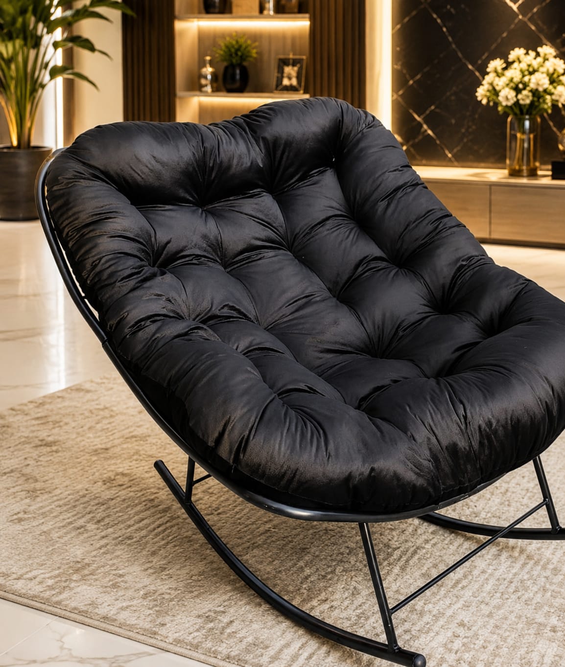 Home Sajawat plush black velvet tufted rocking lounge chair with a sturdy powder-coated black metal frame