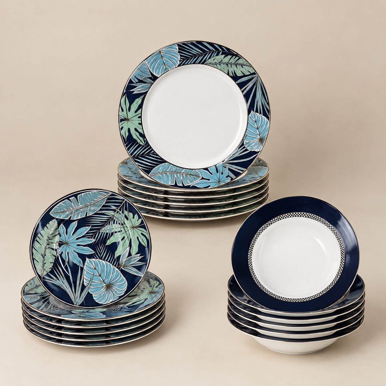 Home Sajawat ceramic dinnerware set featuring blue botanical leaf patterns and monochrome geometric rim designs.