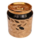 Home Sajawat decorative ceramic storage jar with glossy black top and textured metallic gold body, soda can lid style.