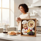 Home Sajawat chef-themed wall clock with coffee graphic, bread, and grapes in a kitchen setting.