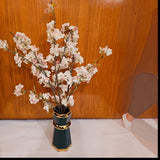 Home Sajawat artificial cherry blossom arrangement with pink and white flowers in a geometric emerald green gold vase