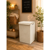 Home Sajawat cream corduroy rectangular laundry hamper with lid and metal grommets in a cozy modern bedroom setting.