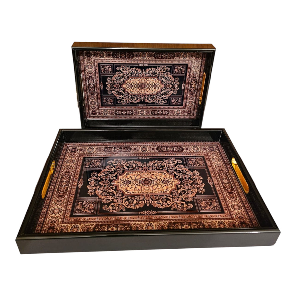 Home Sajawat decorative serving tray set featuring intricate black and gold Persian rug patterns with sturdy gold handles