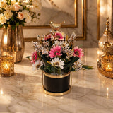 Home Sajawat artificial floral arrangement with pink and white flowers in a black planter with a gold bird accent.