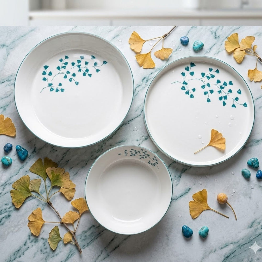 Home Sajawat white porcelain serving platter with teal floral design and teal rim. Perfect for appetizers or desserts.