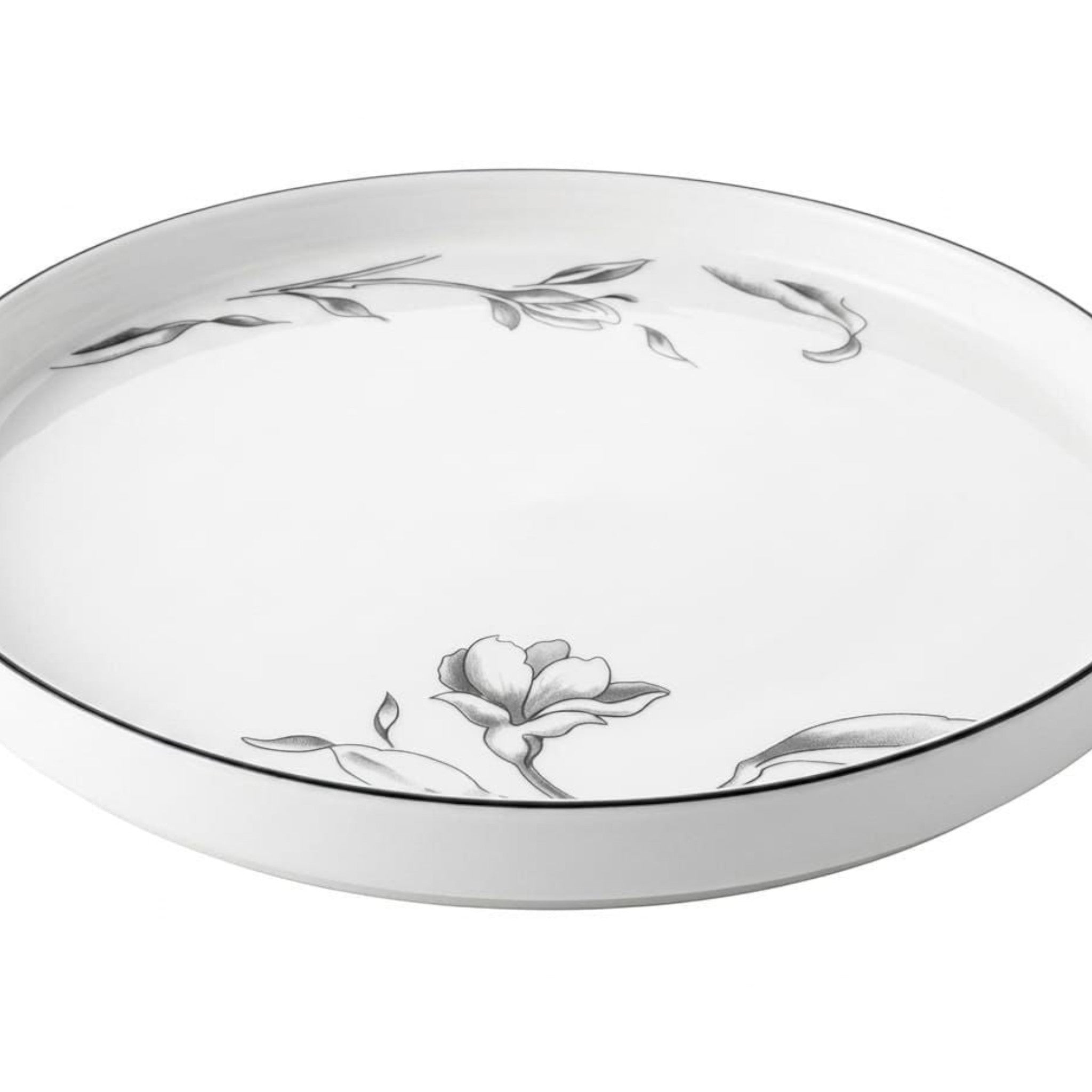 Home Sajawat white porcelain serving platter with delicate floral design and black trim.