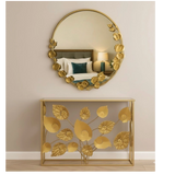 Home Sajawat gold metal round mirror and console table set with sculpted botanical leaf motifs for elegant home decor.