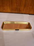 Home Sajawat rectangular mirrored vanity tray with a polished gold-tone metal frame and HOME label detail.