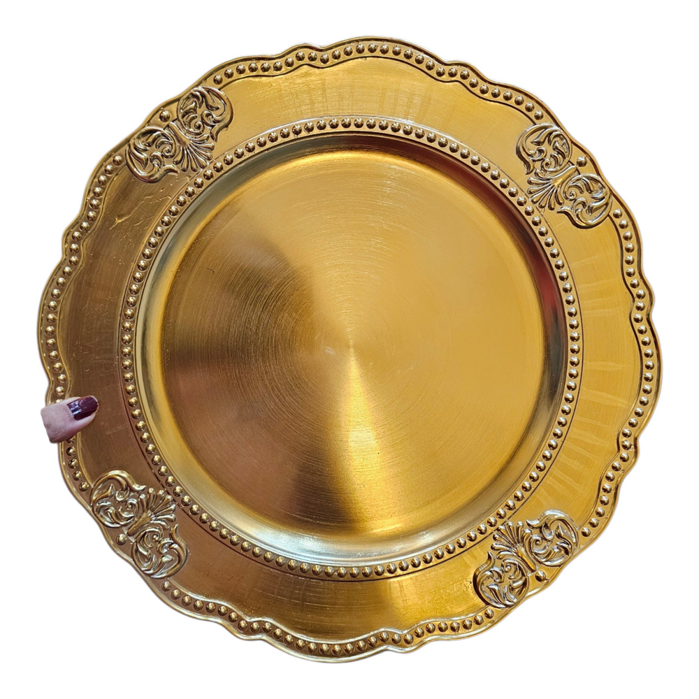 Home Sajawat gold decorative charger plate with ornate scrollwork, beaded rim, and a polished metallic finish.
