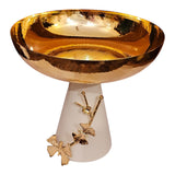 Home Sajawat gold pedestal serving bowl with a cream base and nature-inspired metallic floral accents.