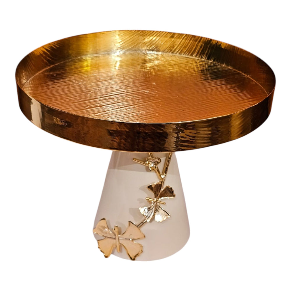 Home Sajawat gold textured pedestal serving tray with a white base and decorative gold butterfly accents.