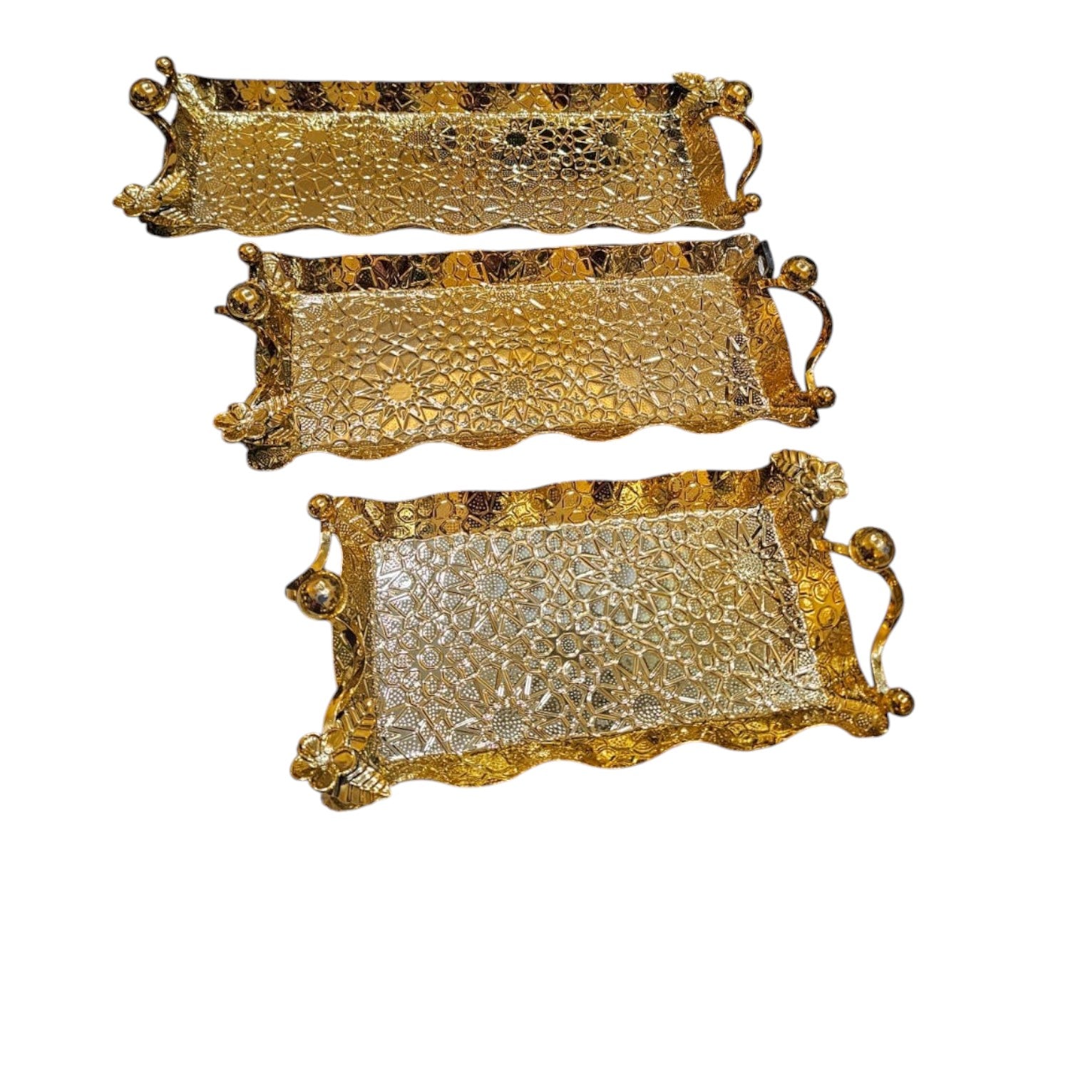 Home Sajawat set of three decorative gold serving trays with hammered texture, curved handles, and scalloped edges.