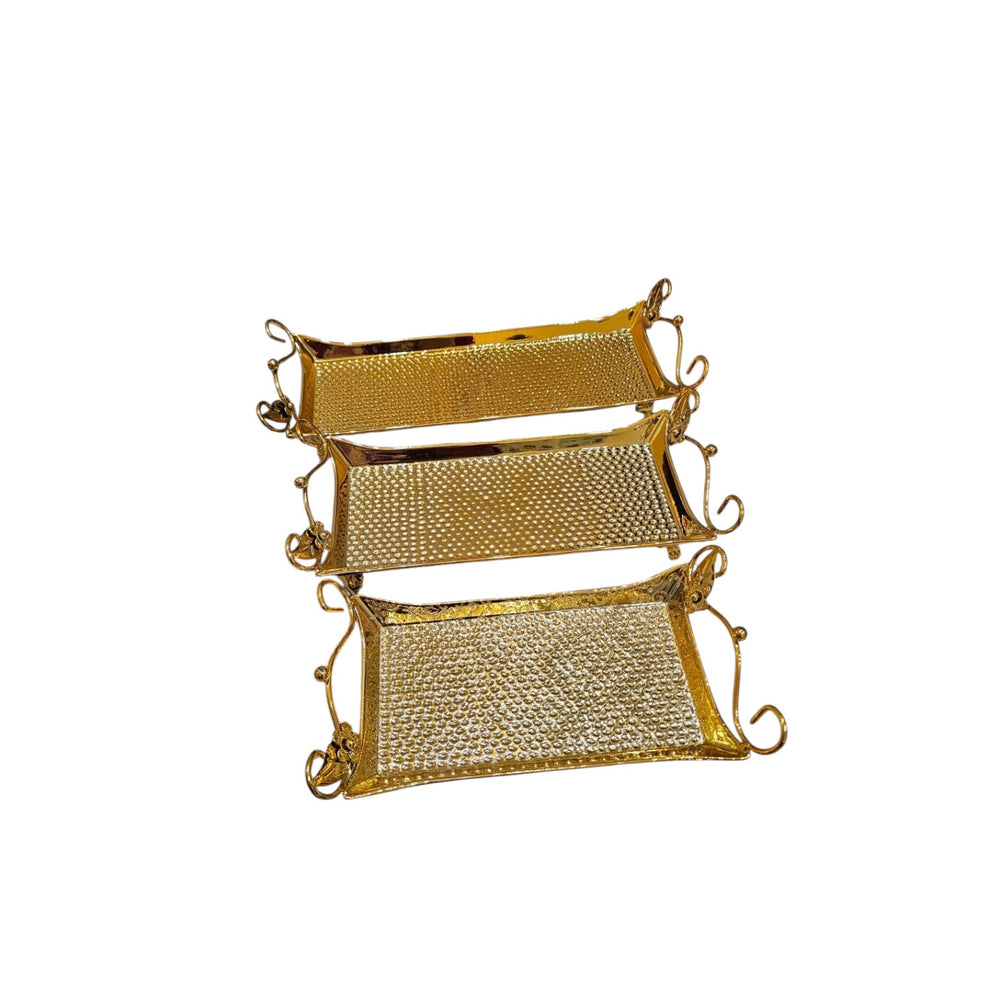 Home Sajawat set of three gold hammered metal serving trays with handles and scalloped edges.