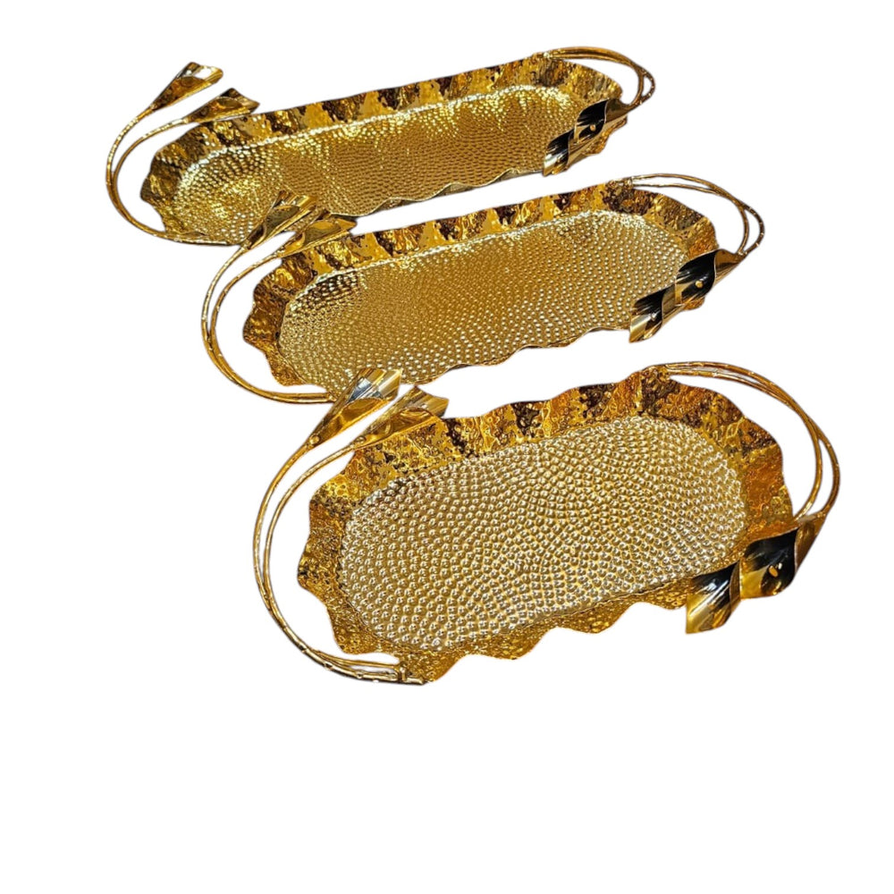 Home Sajawat set of three decorative gold serving trays with hammered texture, scalloped edges, and curved handles.