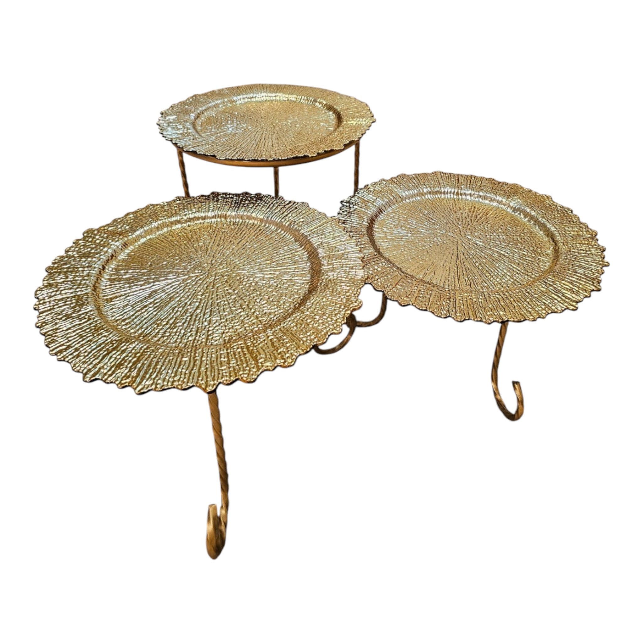 Home Sajawat set of three gold tiered serving stands with textured plates and twisted metal legs.