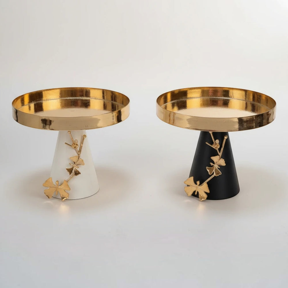 Home Sajawat decorative gold tray with butterfly accents on conical base, available in matte black or ivory.