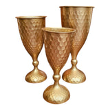 Home Sajawat set of three hammered gold metal goblets with textured finish, perfect for decorative accents.