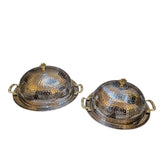 Home Sajawat hammered stainless steel serving dome with gold handles and tray. Elegant cloche for keeping food warm.