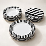 Home Sajawat ceramic dinnerware set featuring monochrome houndstooth, striped, and plaid patterns on glossy plates.