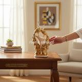 Home Sajawat decorative gold peacock figurine set with green accents, symbolizing prosperity and elegance.