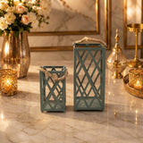 Home Sajawat set of two sage green metal lanterns with lattice patterns and rustic rope handles on a marble table