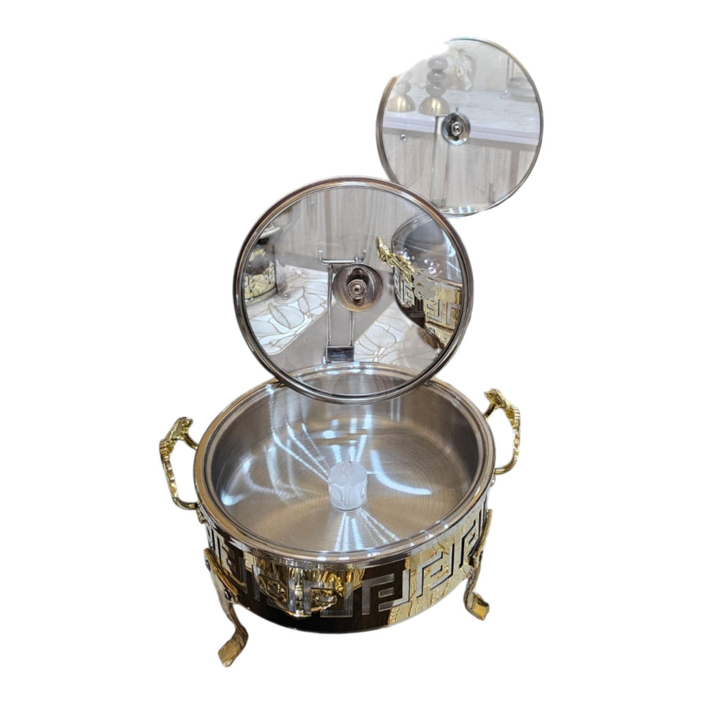 Home Sajawat decorative stainless steel chafing dish with gold Greek key pattern and glass lid, ideal for serving.
