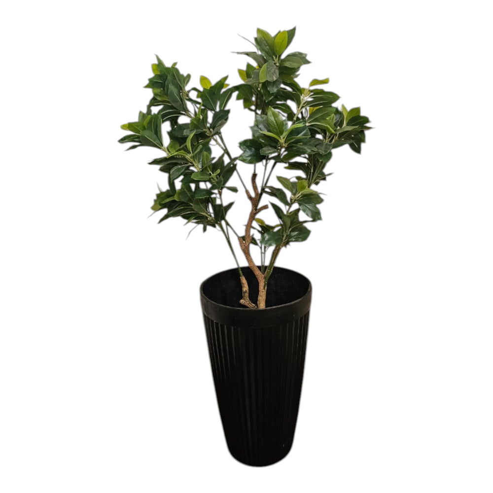 Home Sajawat tall faux plant with green leaves in a ribbed black planter. Realistic artificial foliage.