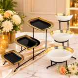 Home Sajawat three-tier serving stand with black and white ceramic plates featuring a gold Greek key pattern.