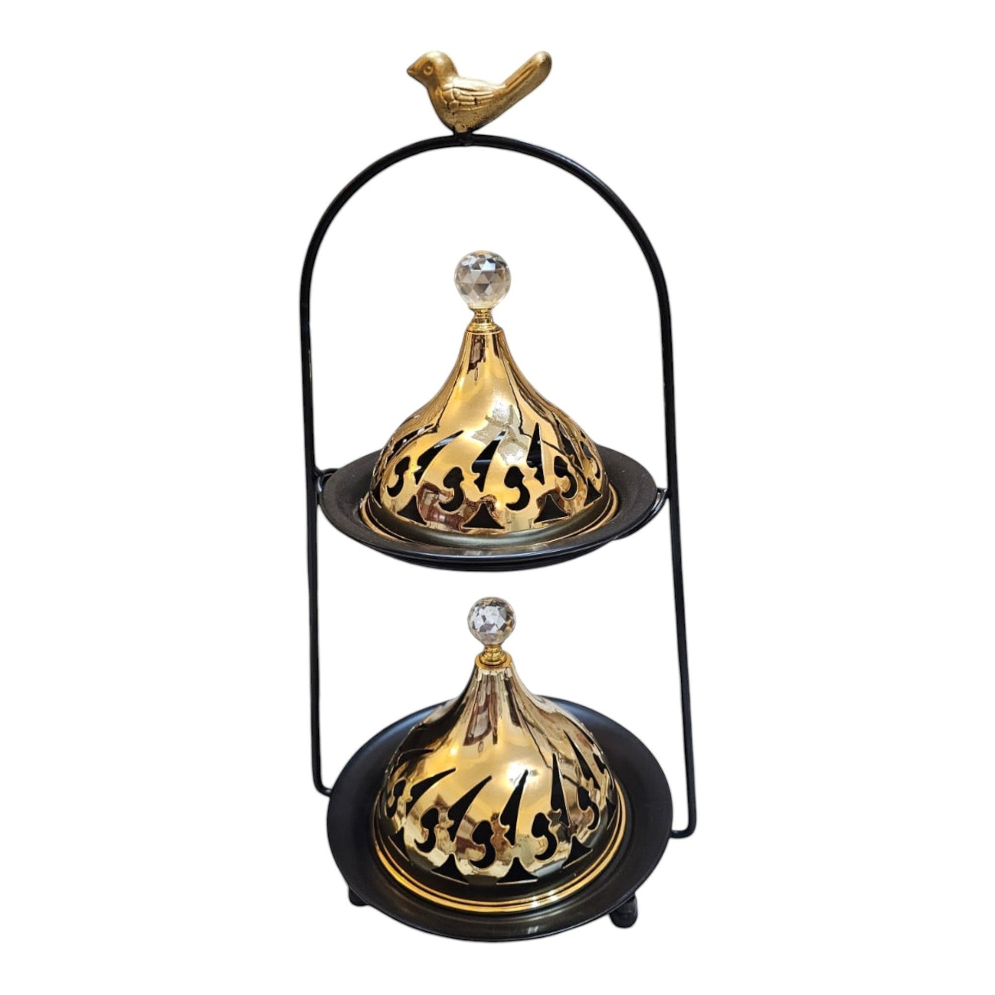 Home Sajawat two-tiered gold incense burner with cut-out lids, crystal finials, and bird accent on black stand.