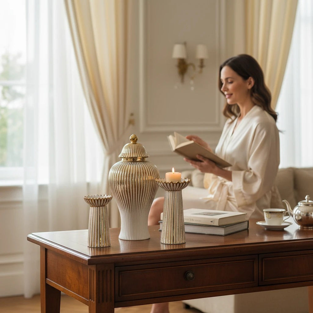 Home Sajawat white ceramic ginger jar and two pedestals with gold stripes and trim. Ribbed detailing.